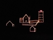 Lighting of the Nubble Cape Neddick Lighthouse (Nubble Light) at Sohier Park in York, ME